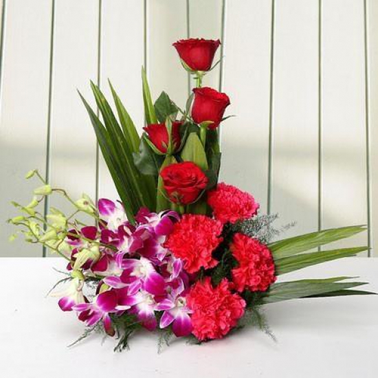 Arrangement Carnations N Orchiddelivery in Indore
